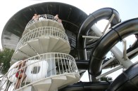Ride goers walk up the stairwell of the newly revamped Black Hole at Wet 'n Wild in Orlando on Tuesday, May 20, 2008. Sara A. Fajardo/Orlando Sentinel