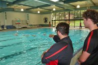 'Eye, Eye,' Captain: It is important that the supervisor stand close to the lifeguard so they share the same vantage.