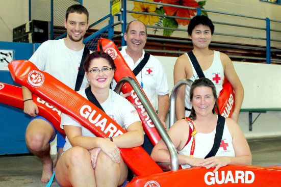 Jeff Fryer (center), aquatic/fitness director at River Road Park and Recreation District, received the 2015 Best of Aquatics award from Aquatics International. The district's lifeguards were among some of the first responders following a shooting at a park that occurred Tuesday, April 12. His lifeguards routinely prepare for such an emergency.