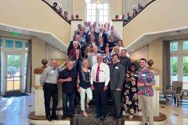 Charlie Luecker, front row center, at his retirement party