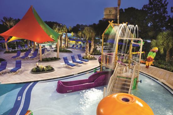 As an expansion of an existing hotel, the aquatics space had to be developed within the confines of the tennis courts it would replace — all while the hotel remained fully operational. Several cost-saving measures were used to stay on budget, such as reusing existing mechanical spaces and landscaping areas, and encouraging the owner to finalize and approve play features upfront to reduce change orders and streamline construction.