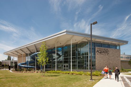 The building’s simple form is enhanced with masonry, metal and extensive glass panels.