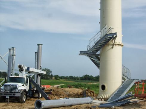 Portions of the 264 steps leading up to the top platform are put in place.